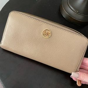 Gently used Michael Kors wallet very clean inside